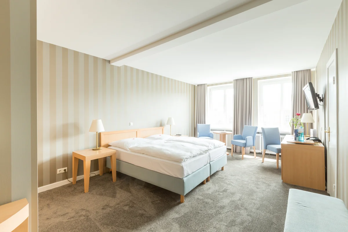 Example room · Furnishings and views vary within each category.